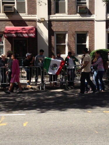 A group of people holding the Mexican flag at the Muslim Day Parade NYC 2014 - Óoorale! 